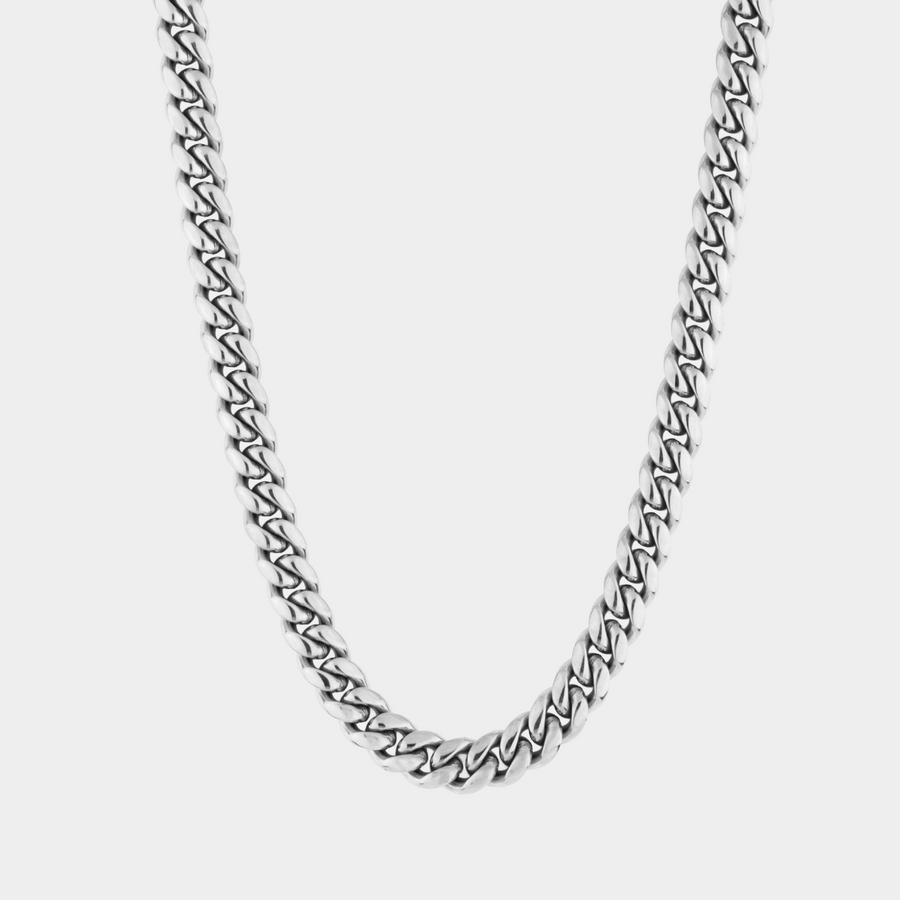 Silver chain necklace on a white background