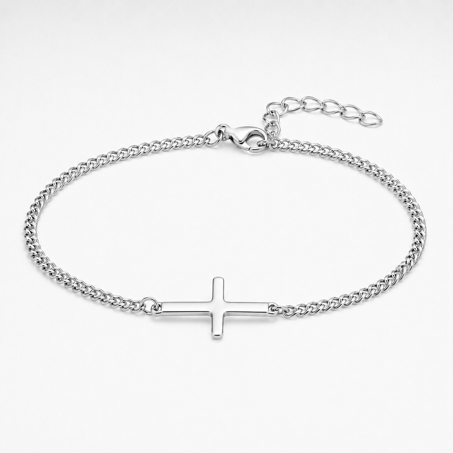 A silver-toned chain bracelet with a flat, polished cross charm in the center, displayed on a clean white background.