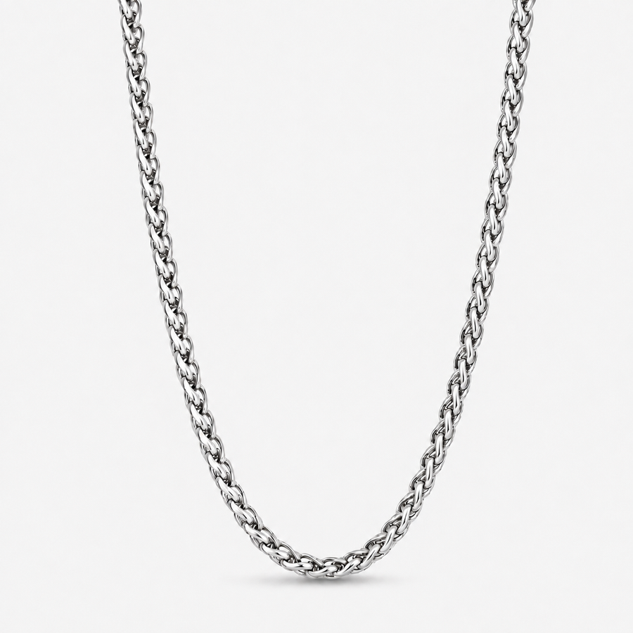 A silver-toned metal chain necklace with a braided curb link design, shown against a plain light gray background.