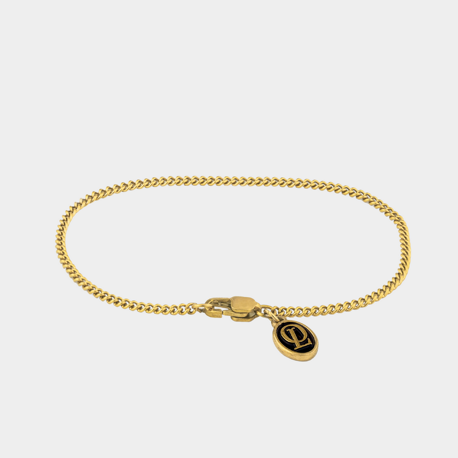 2mm gold connell chain bracelet on a white background