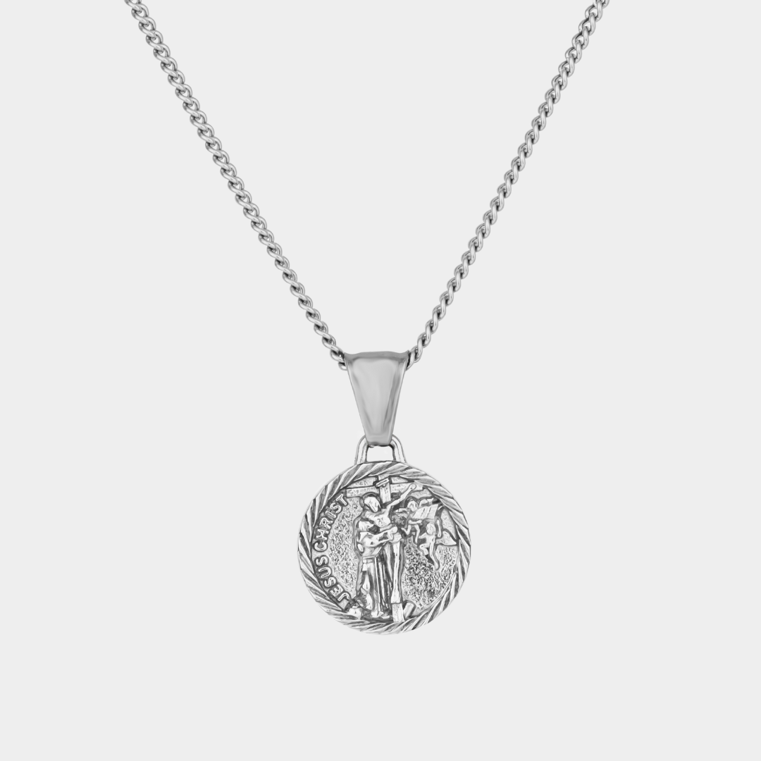 Silver Jesus Christ Necklace Pendant on a white background
