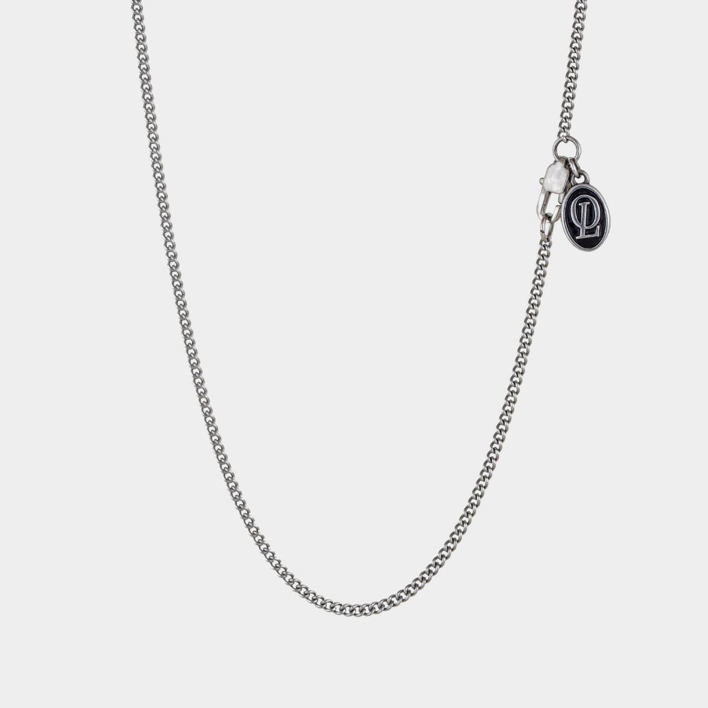 2mm silver connell chain necklace on a white background