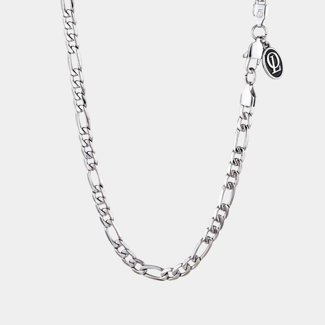 Silver chain necklace on a white background