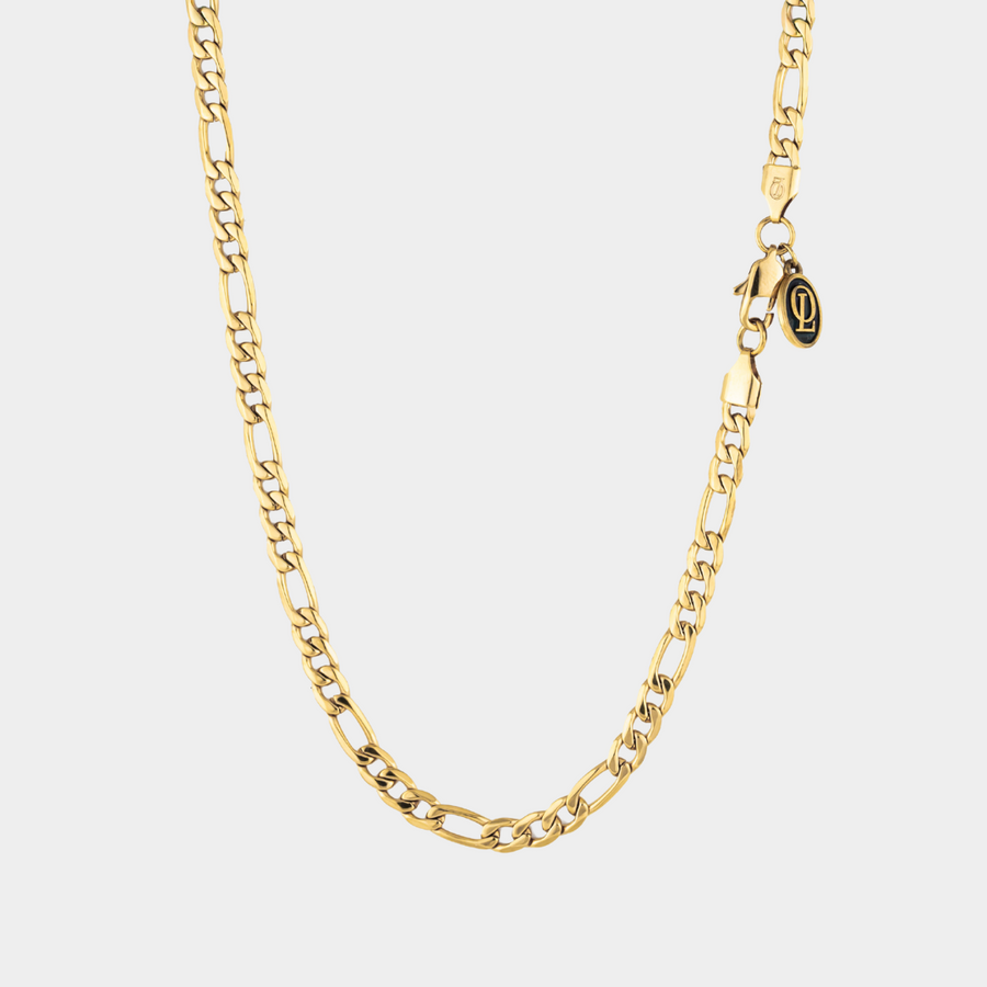 Gold figaro chain necklace 5mm on a white background