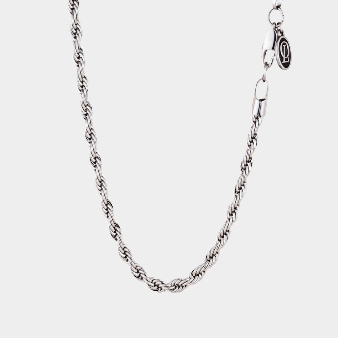 Silver chain necklace on a white background