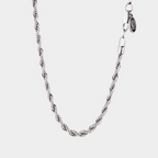 Silver chain necklace on a white background