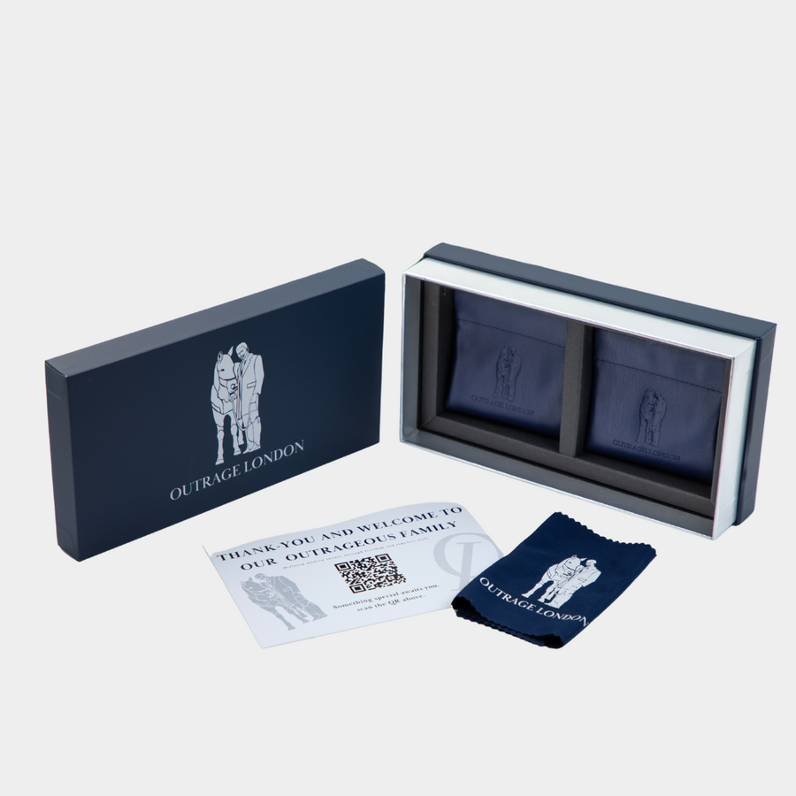 Outrage London product packaging with branded items on a light gray background
