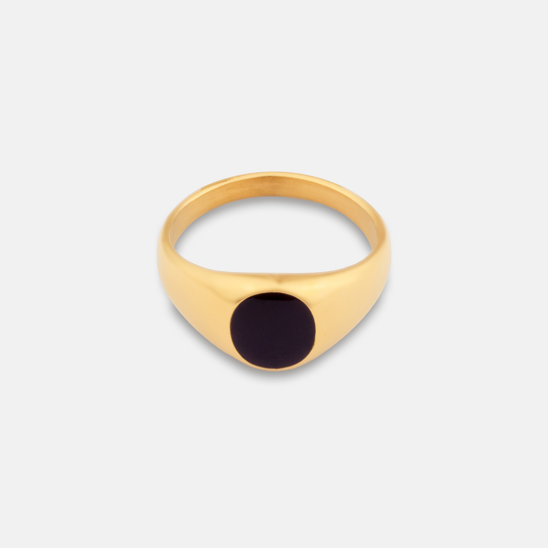 Gold Onyx Stone Signet Ring on a white background