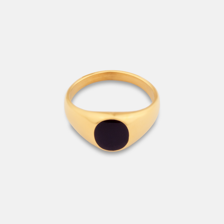 Gold Onyx Stone Signet Ring on a white background