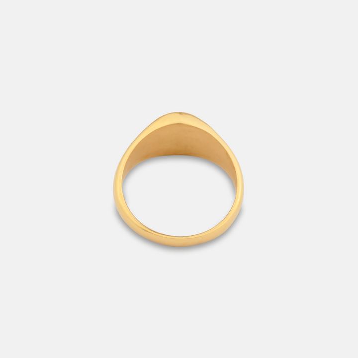 Gold Onyx Stone Signet Ring on a white background