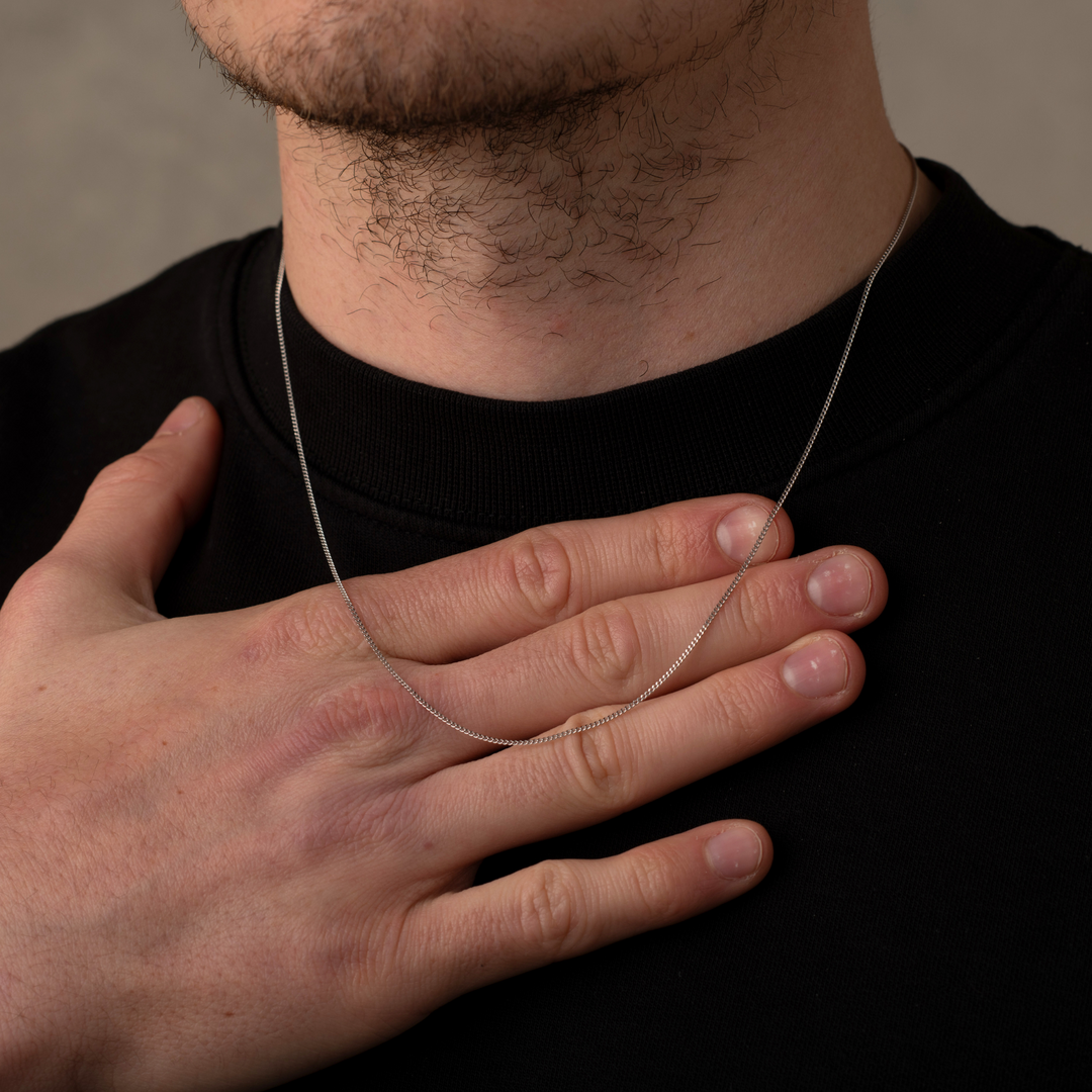 Man wearing a 1mm 925 silver necklace
