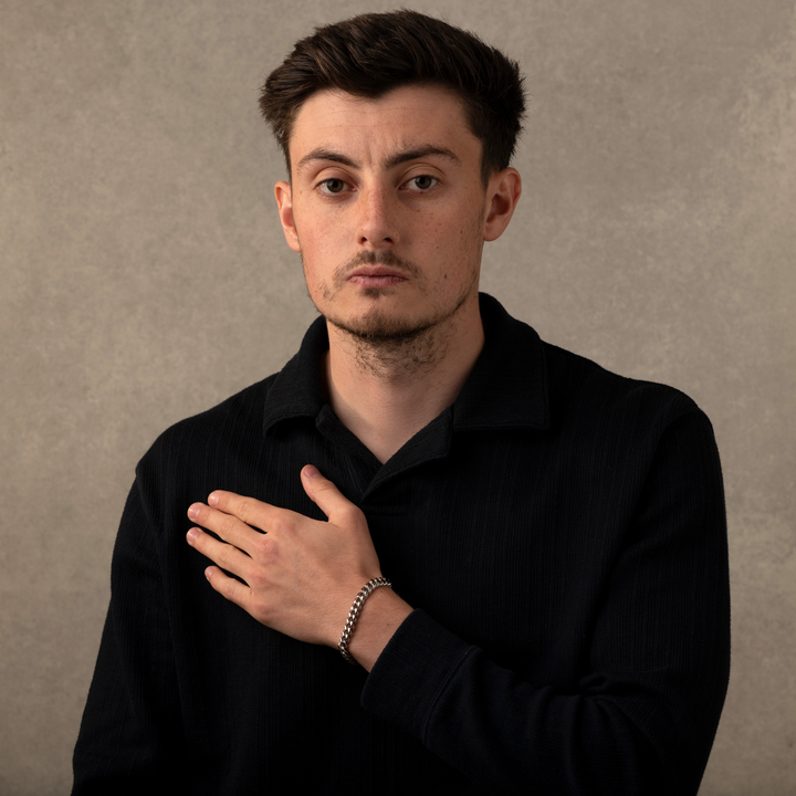 Man Wearing a Silver Cuban Chain Bracelet 7MM
