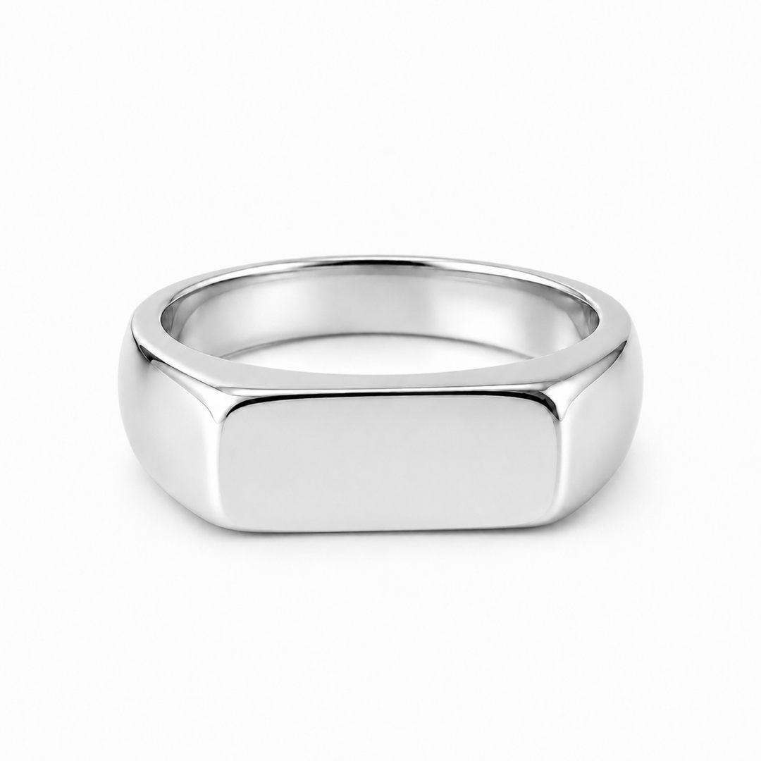 A polished silver signet ring with a flat, rectangular face and rounded shoulders, shown on a clean white background.