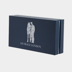 Navy blue box with 'Outrage London' logo featuring a horse and person on a white background