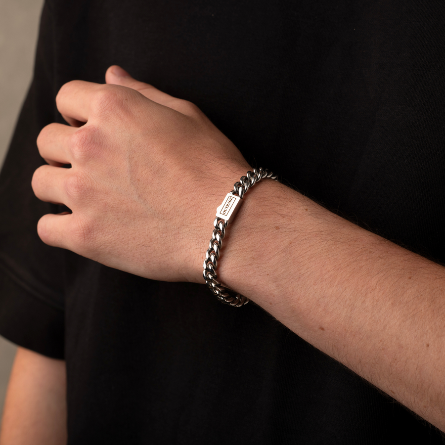Man Wearing a Silver Cuban Chain Bracelet 8MM