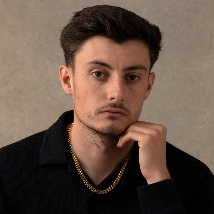 Man Wearing a Gold Cuban Chain Necklace 7MM