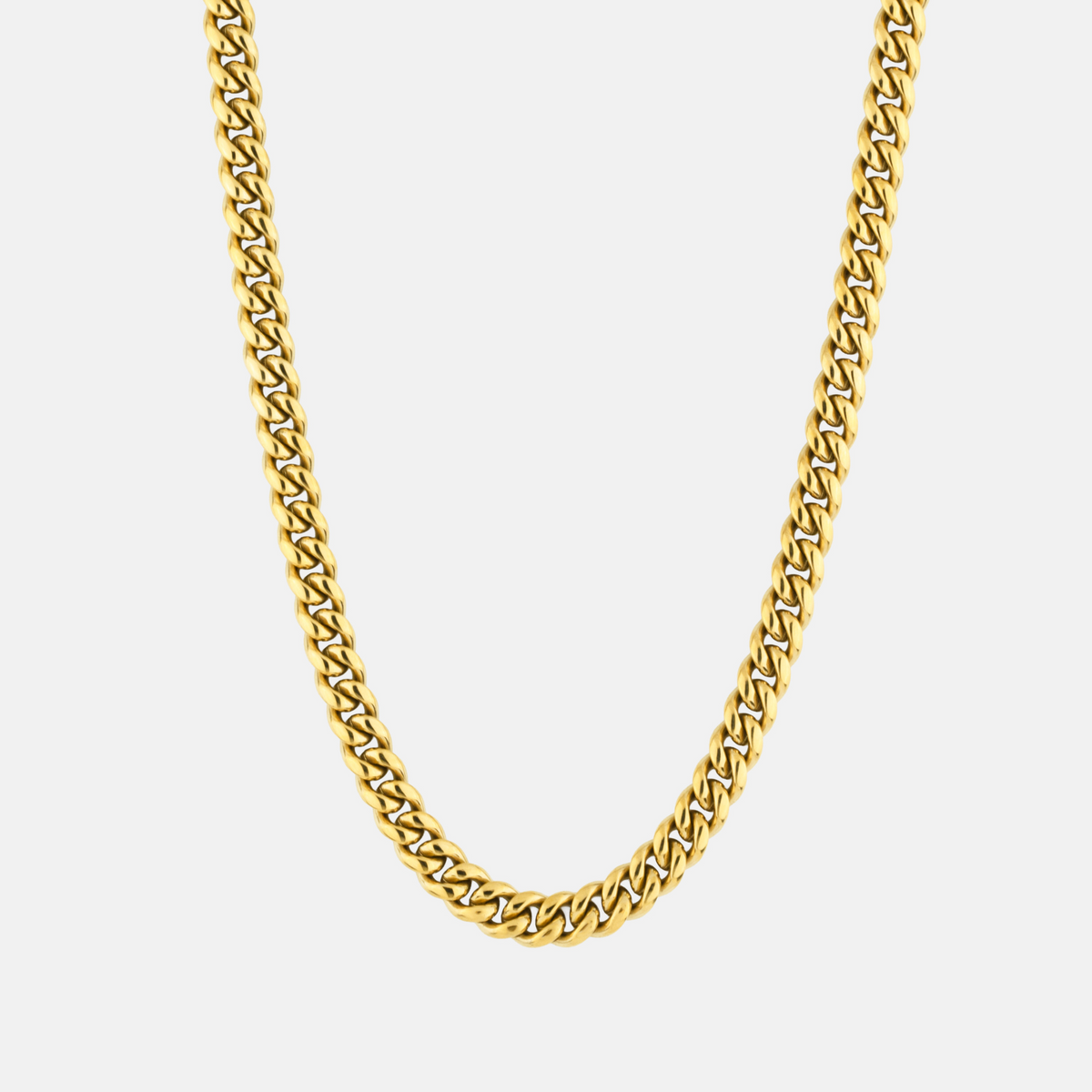 Gold chain necklace on a white background
