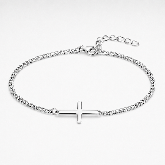 A silver-toned chain bracelet with a flat, polished cross charm in the center, displayed on a clean white background.