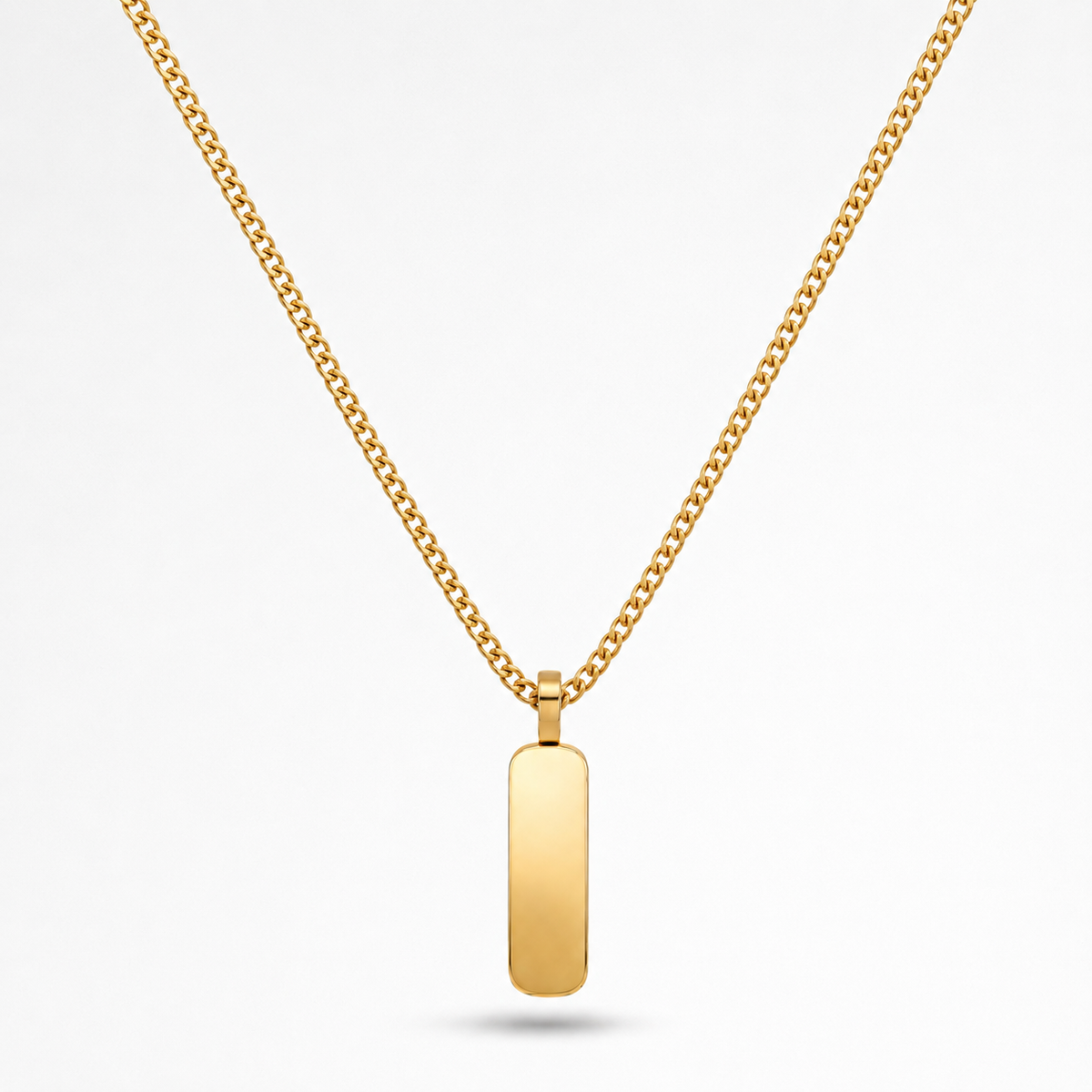 A gold chain necklace with a flat, polished rectangular bar pendant, shown against a clean white background.