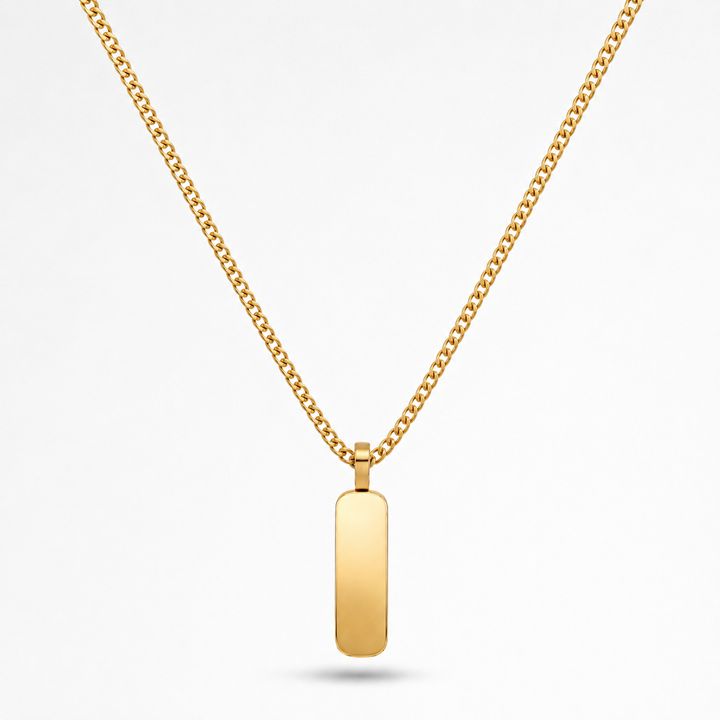 A gold chain necklace with a flat, polished rectangular bar pendant, shown against a clean white background.