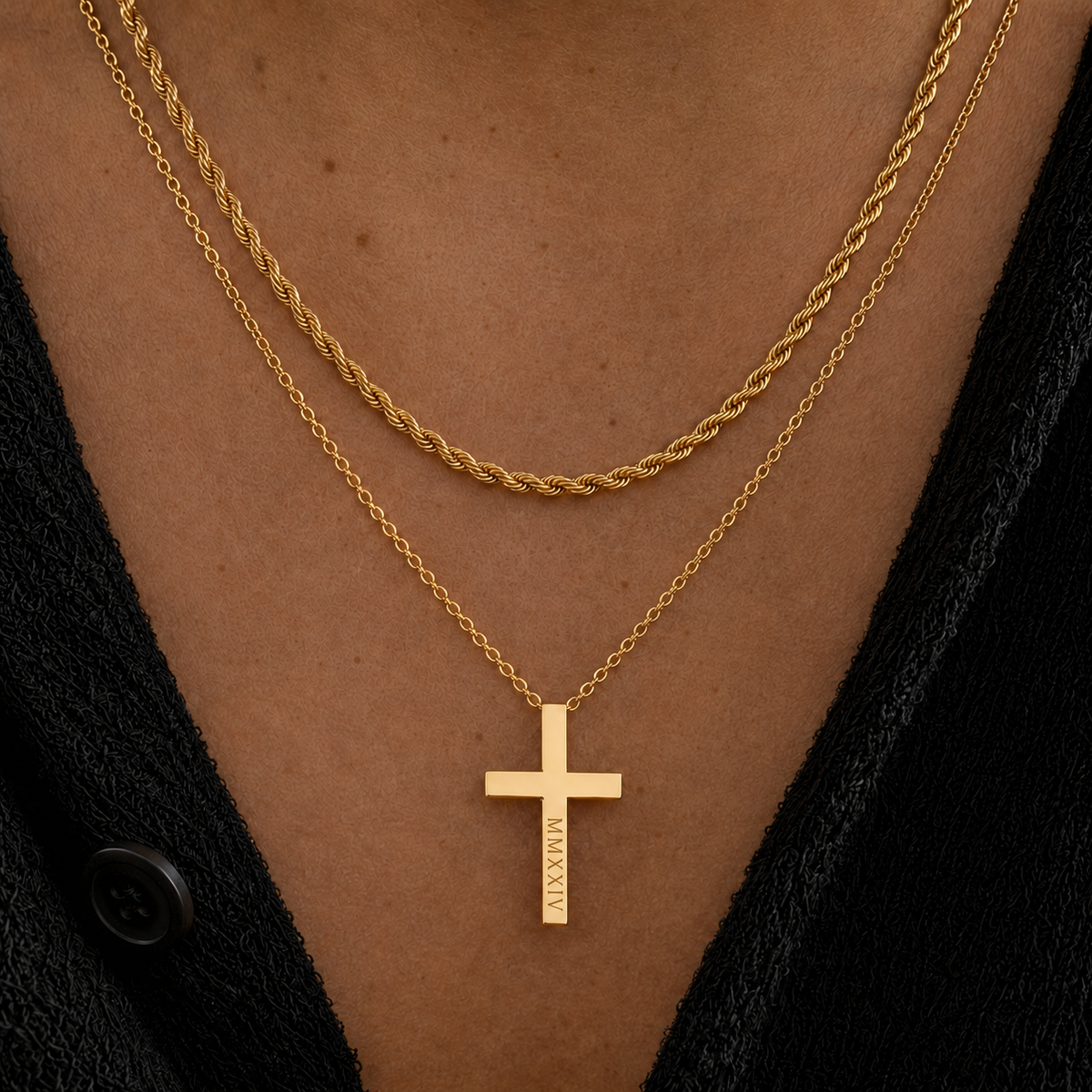 Man wearing a gold cross necklace