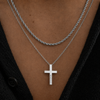 man in the sun wearing a silver cross pendant stacked with a 3mm rope chain