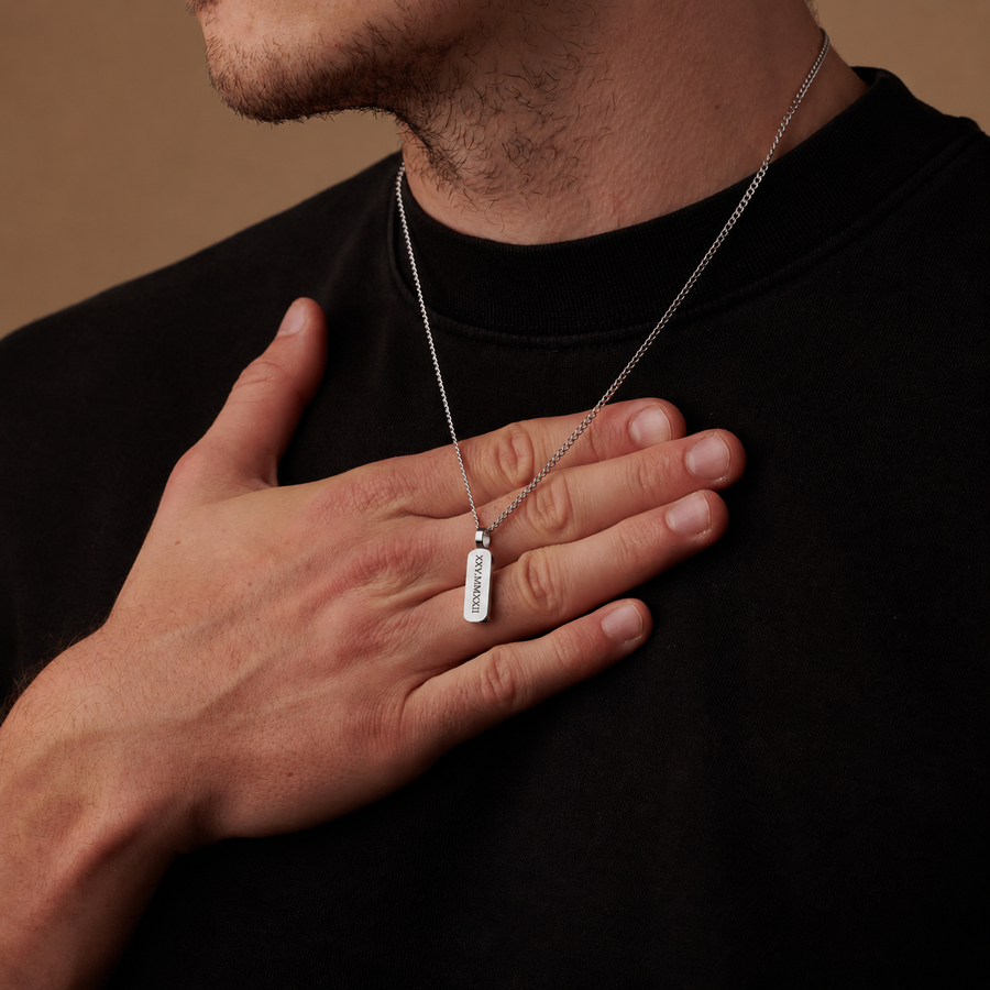 Silver Totem pendant being worn on a man
