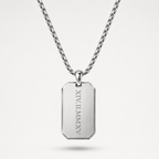 A silver-toned stainless steel dog tag necklace with a rectangular pendant engraved with vertical Roman numerals, suspended from a matching chain against a light gray background.