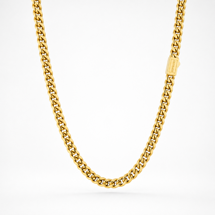 Gold chain necklace on a white background