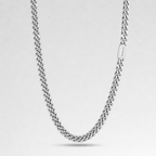 A silver-toned curb chain necklace with a rectangular clasp engraved with the brand name 'JEWELRY', displayed against a clean light gray background.