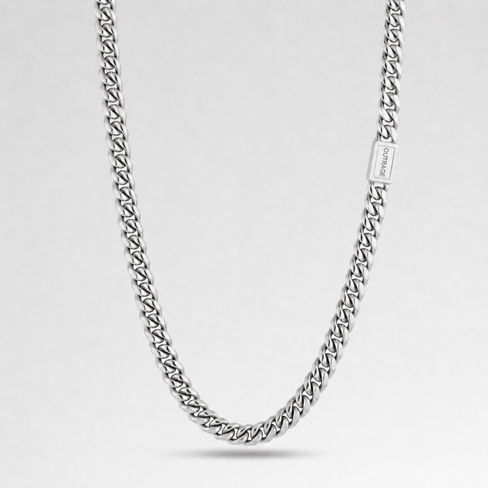 A silver-toned curb chain necklace with a rectangular clasp engraved with the brand name 'JEWELRY', displayed against a clean light gray background.