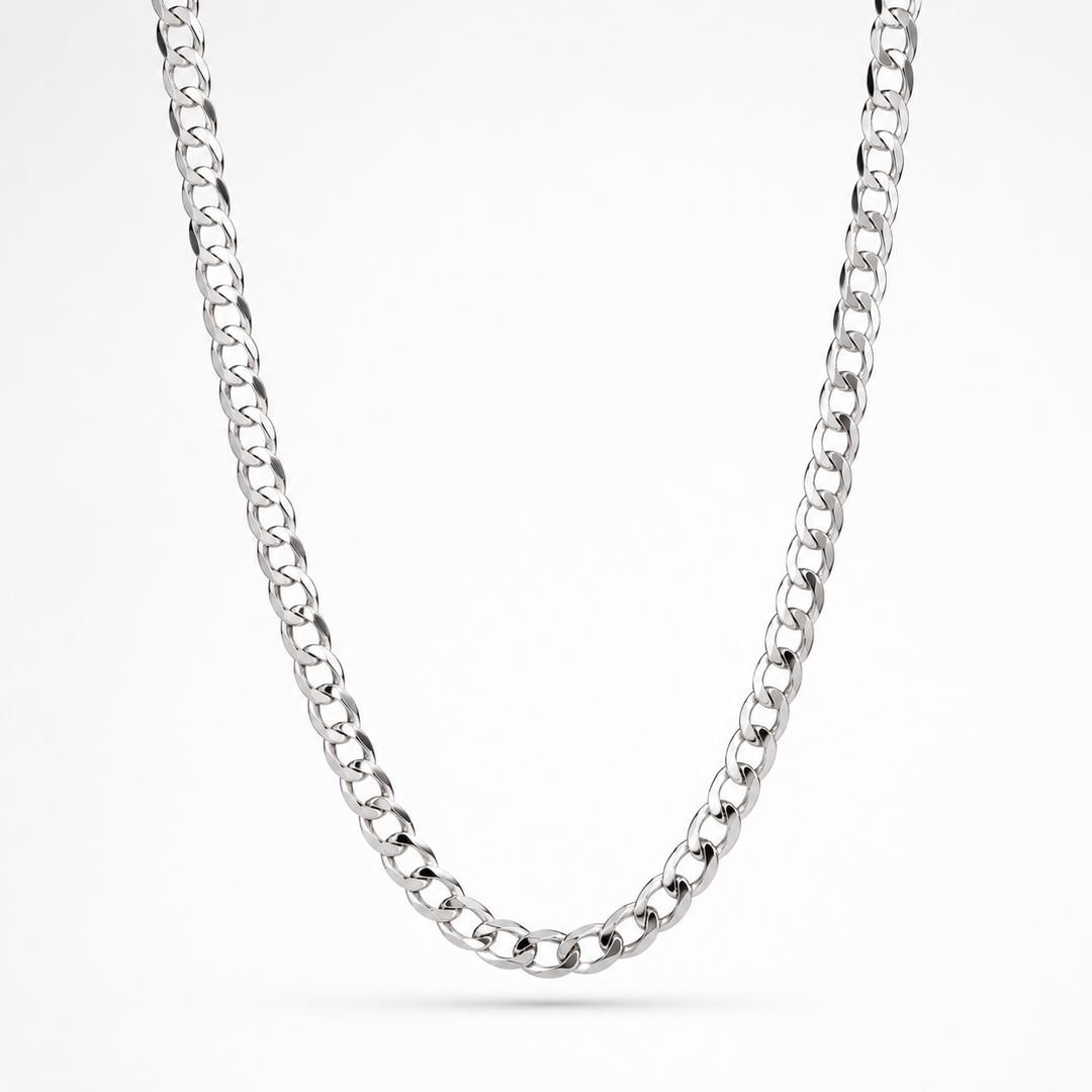 A polished silver-tone curb chain necklace draped in a U-shape against a clean white background.