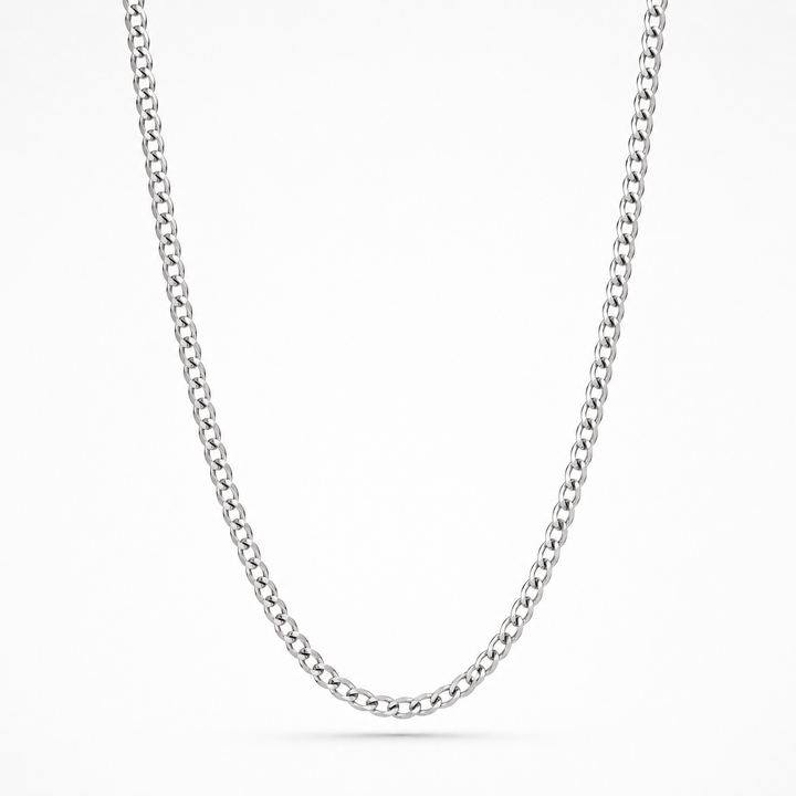 A classic silver-toned curb link chain necklace, shown draped in a U-shape against a clean white background.