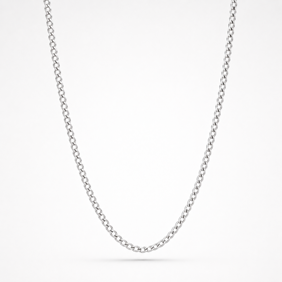 A silver-toned metal chain necklace, shown draped in a U-shape against a clean white background.