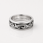 A silver band ring with an engraved black scroll pattern and the text 'Daddy i love you xx' inside, shown on a clean white background.