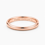 A polished rose gold band ring engraved with 'Daddy I Love you xx' on the inside, shown on a clean white background.