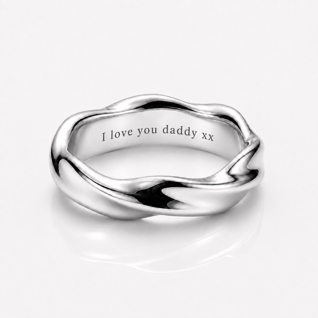 An engraved mens band ring by Outrage London