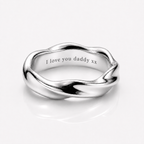 An engraved mens band ring by Outrage London