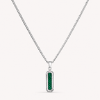A silver-toned chain necklace with a vertical rectangular pendant featuring a textured green inlay, shown on a light off-white background.