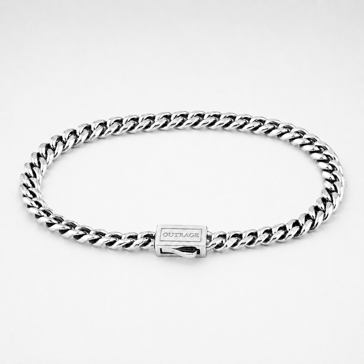 A silver-tone Cuban link chain bracelet with a rectangular clasp engraved with the brand name 'OUTRAGE', displayed on a clean white background.