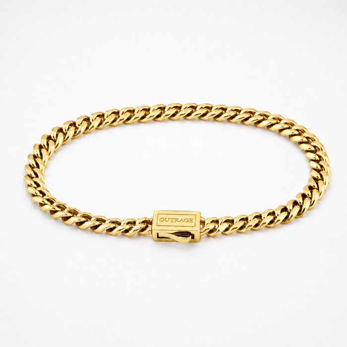 A gold Cuban link chain bracelet with a rectangular clasp engraved with the brand name 'OUTRAGE', displayed on a clean white background.