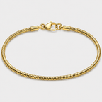 A gold-toned metal chain bracelet with a lobster clasp, shown in a circular loop on a light gray background.