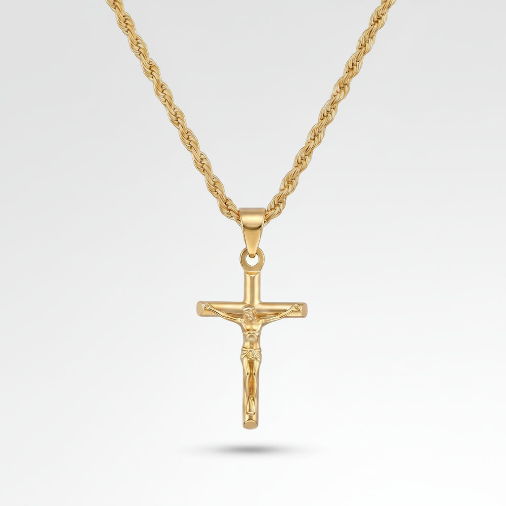 Gold crucifix pendant necklace on a light gray background