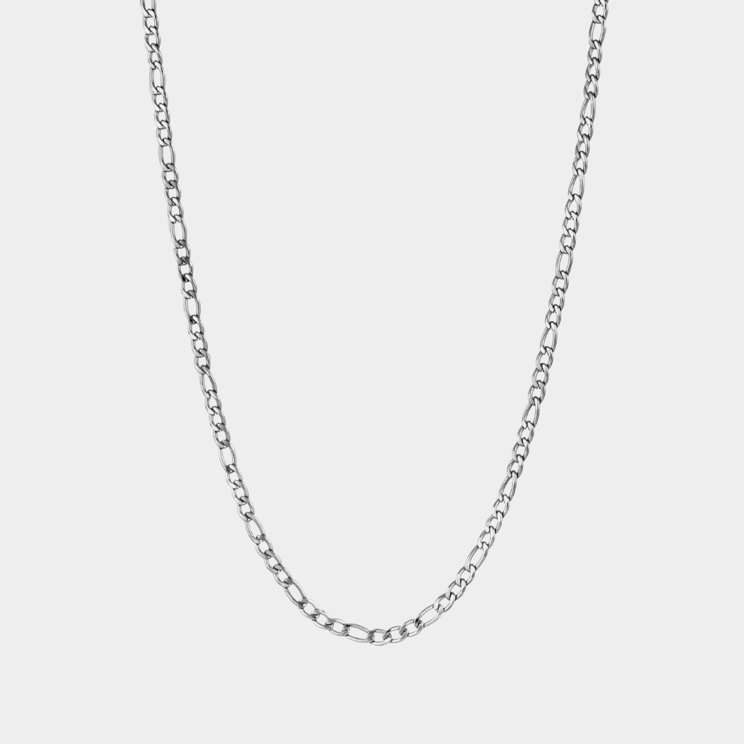 A silver Figaro chain necklace with a lobster claw clasp, displayed against a white background.