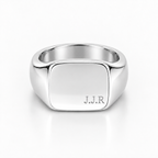 A polished silver signet ring with a square face engraved with the initials 'J.J.R', shown on a clean white background.