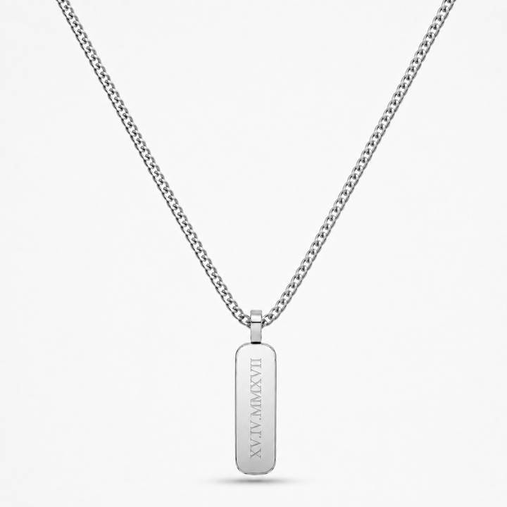 Engraved pendant on a white background