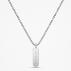 Engraved pendant on a white background