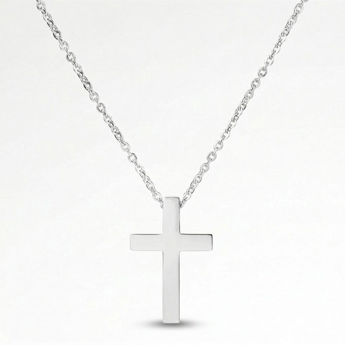 A silver cross pendant necklace against a white background.