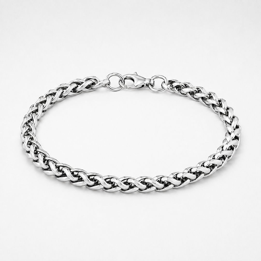 A silver-toned metal curb chain bracelet with a lobster clasp, displayed on a clean white background.