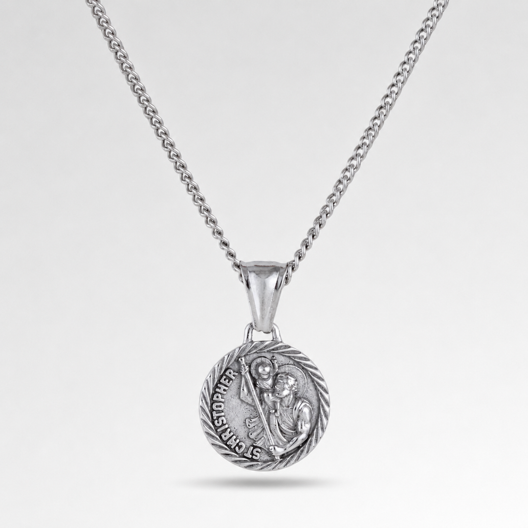 Silver necklace with a pendant on a light gray background